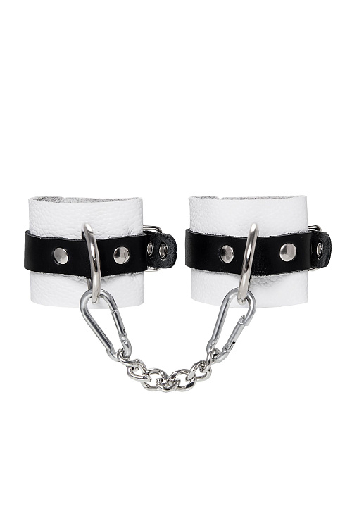 Бело-черные кожаные наручники с одним ремешком с люверсами