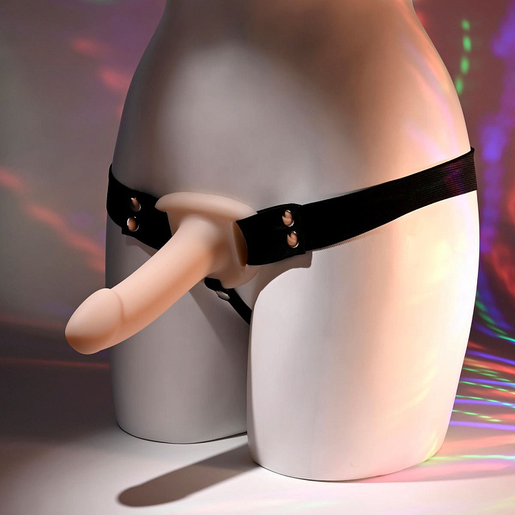 Телесный полый страпон с черными эластичными ремешками Our First Hollow Strap On